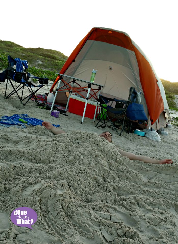 Buried in the Sand - Beach Camping - QueMeansWhat.com