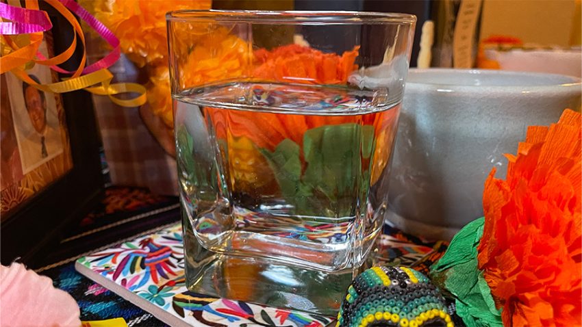 glass of water for dia de muertos ofrenda
